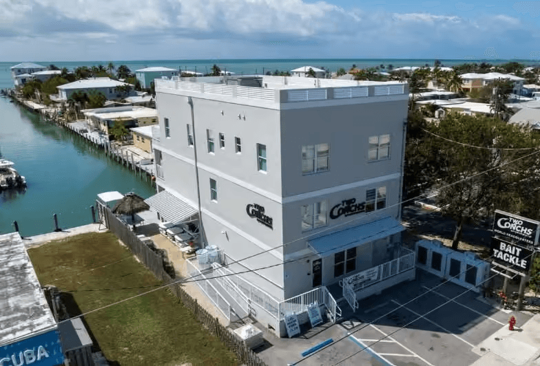 Three-story waterfront commercial building on a Florida Keys canal